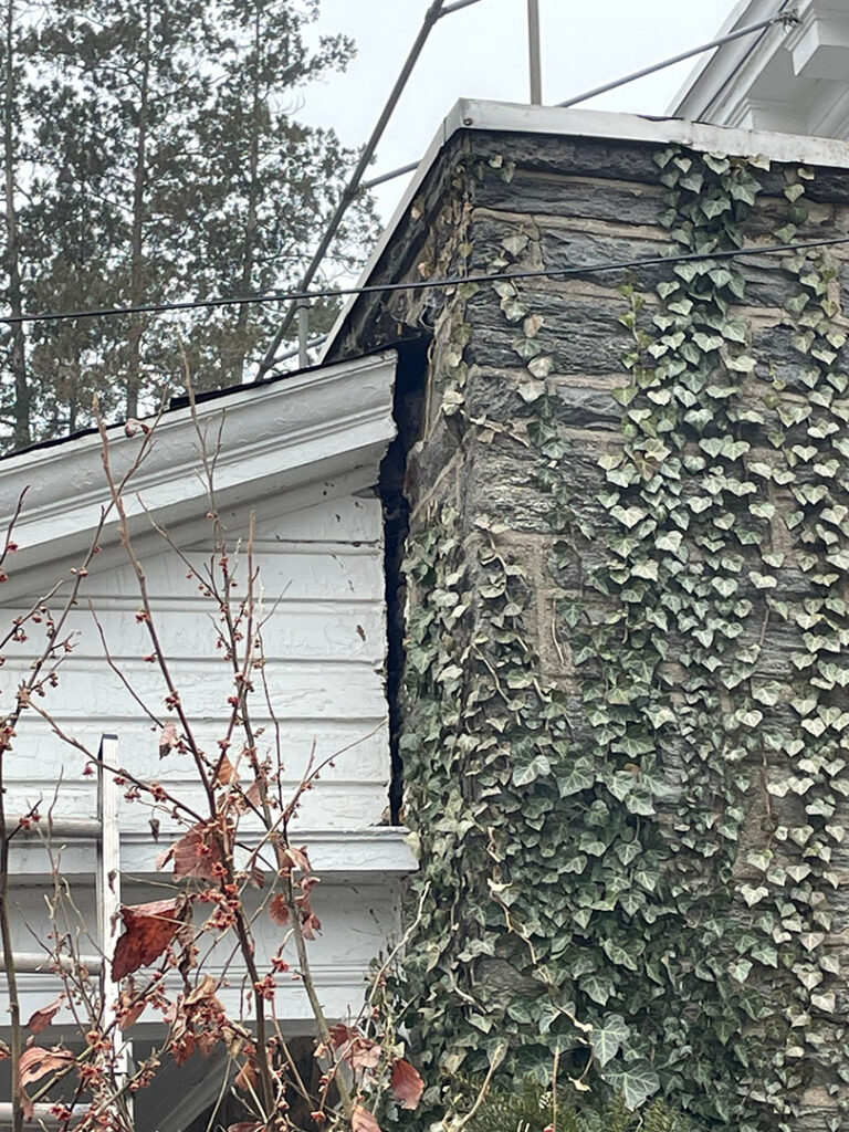 Roof structure pulling away from the house due to the sag below.