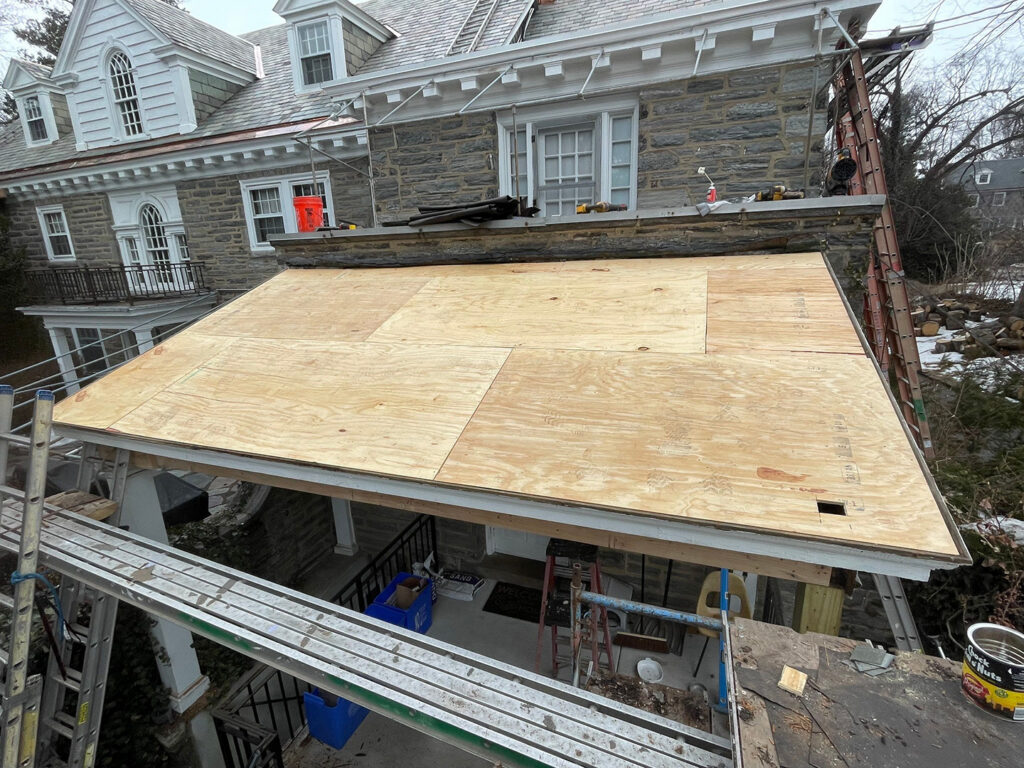 New CDX exterior-grade plywood roof deck installed.