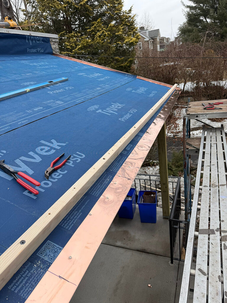 High temperature ice and water shield used for secondary waterproofing (specially made for metal roofing), copper perimeter edge, and new gutter pole installed.